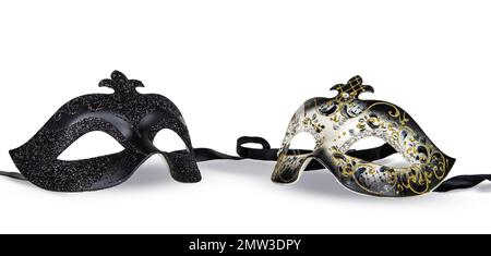 Masquerade and carnival concept with two different luxury Venetian masks isolated on white background. Stock Photo