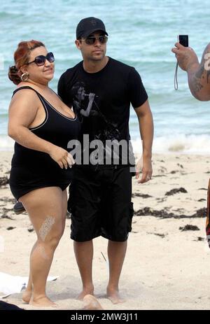 EXCLUSIVE!! American actor Wilmer Valderrama, best known for the role of Fez in the sitcom 'That '70s Show,' shows off his beach body as he cools off in the Atlantic Ocean with friends during a visit to Miami Beach, FL. 8/23/09. Stock Photo