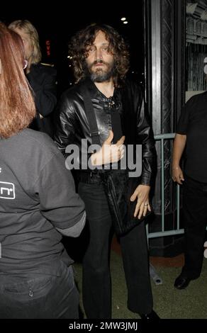 Exclusive!! Vincent Gallo attends an event at the Wiltern Theatre, and flashes his middle finger as he runs inside away from photographers in Los Angeles, CA. 6/21/09. Stock Photo