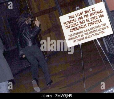 Exclusive!! Vincent Gallo attends an event at the Wiltern Theatre, and flashes his middle finger as he runs inside away from photographers in Los Angeles, CA. 6/21/09. . Stock Photo