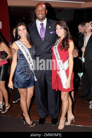 Alonso Mourning, Miss Florida USA and Miss Florida Teen USA at the opening ceremony for Winterfest at the Seminole Hard Rock Hotel and Casino. As part of the event, Lorenzo Lamas showed off a custom signature motorcycle and Alonso Mourning was presented with a key to the city of Fort Lauderdale. Guests were also treated to performances by talented youngsters from the city. The event culminates with Christmas boat parade on the Intracoastal Waterway in Fort Lauderdale, FL. 12/11/09. Stock Photo