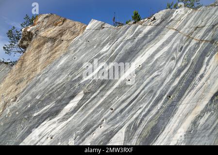 A section of a marble rock close-up. Ruskeala Mountain Park, Karelia Stock Photo
