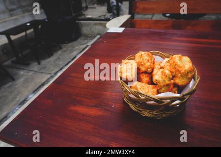 Indonesian street food, Fried Tofu Filled With Vegetables(Tahu Isi) served on the table Stock Photo