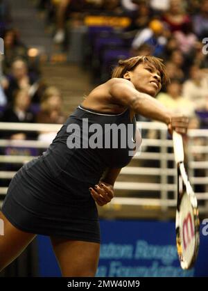 Serena Williams competes on the court at the Advanta World TeamTennis (WTT) Smash Hits charity tennis event with Anna Kournikova. The annual tennis event was held at the Peter Maravich Assembly Center on the campus of Louisiana State University. Baton Rouge, LA 12/8/09.   .     . Stock Photo