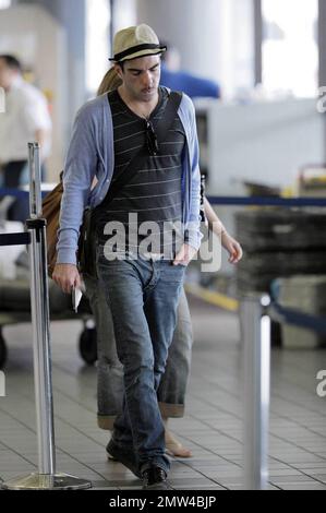 Zachary Quinto turns 32 today and was sporting a new moustache as he made his way through LAX. The 'Star Trek' star was en-route to Mexico City for a movie premiere. Los Angeles, Ca. 6/2/09. Stock Photo