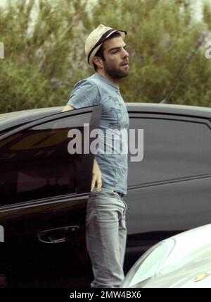 Exclusive!! Actor Zachary Quinto was seen out and about this afternoon.  The 'Star Trek' actor dressed in jeans, flip flops, a t-shirt with zebras and his trademark fedora as he ran some errands before heading to a lunch meeting in West Hollywood. Los Angeles, CA.  5/9/09. Stock Photo