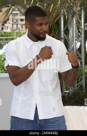 Usher at the photocall for 'Hands of Stone', held at the Cannes Palais des Festivals et des Congrès during the 69th Cannes International Film Festival in Cannes, France. 16th May, 2016. Stock Photo