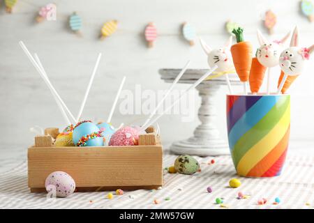 Different delicious sweet cake pops on table. Easter holiday Stock Photo