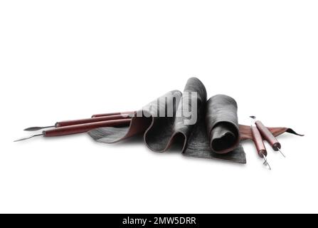 Leather samples and craftsman tools isolated on white Stock Photo