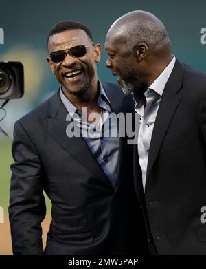 April 1, 2011; Oakland, CA, USA; Former Oakland Athletics pitcher Dave  Stewart throws out the ceremonial first pitch before the game against the  Seattle Mariners at Oakland-Alameda County Coliseum Stock Photo - Alamy