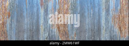 Texture of an old metal plate in blue, grey and rust colors Stock Photo