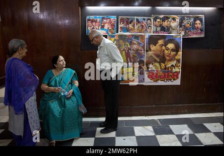 in this wednesday march 29 2017 photo elderly indians arrive to watch the last movie screening at regal theater in new delhi india with its corridors studded with black and white images of bollywood stars such as nargis madhubala meena kumari dev anand and raj kapoor the magic of a bygone era was visible throughout the theater from bollywood superstars to political heavyweights the theater had hosted some of indias biggest names over more than eight decades but with nostalgic theater goers singing their way to the exits after a final showing of a bollywood classic the iconic new 2mw62ph