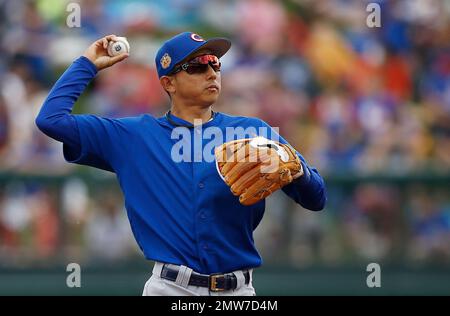 Peoria, Arizona, USA. 10th Mar, 2017. Munenori Kawasaki (Cubs) MLB :  Munenori Kawasaki of the Chicago Cubs throws the ball during a spring  training baseball game against the Seattle Mariners at Peoria