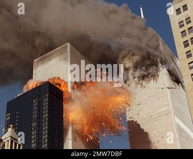 https://l450v.alamy.com/450v/2mw7dbf/file-in-this-sept-11-2001-file-photo-smoke-billows-from-one-of-the-towers-of-the-world-trade-center-and-flames-as-debris-explodes-from-the-second-tower-in-new-york-family-members-of-911-families-and-others-harmed-in-the-terrorist-attacks-are-on-a-fresh-quest-to-hold-saudi-arabia-responsible-a-magistrate-judge-presiding-over-a-thursday-march-23-2017-hearing-says-she-hopes-to-streamline-the-legal-process-to-speed-the-lawsuits-along-ap-photochao-soi-cheong-file-2mw7dbf.jpg