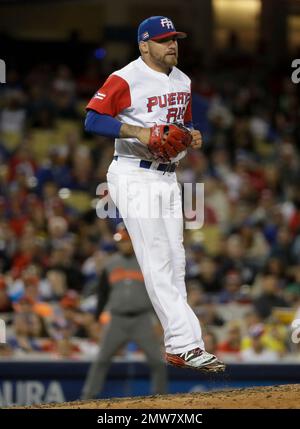 March 20, 2017: Puerto Rico infielder Francisco Lindor #12 and Puerto Rico  infielder Javier Baez #9 confront Netherlands outfielder Wladimir Balentien  #4 after he fave a sign tot he pitcher in the