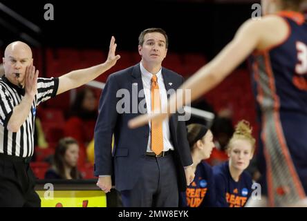Bucknell head coach Aaron Roussell directs his players in the first