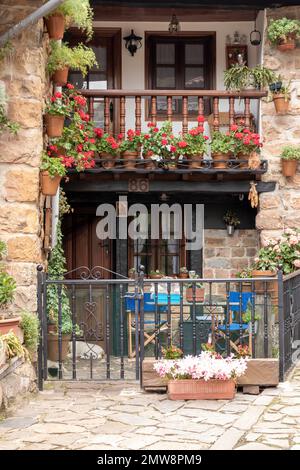 houses and narrow streets in a mountain village in the north of Spain. Barcena Mayor. Stock Photo