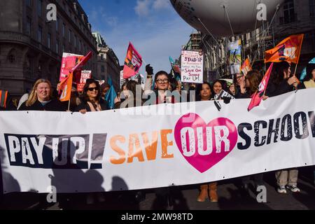 London, UK. 1st February 2023. Dr Mary Bousted, joint general secretary of the National Education Union, joins the march in Regent Street. Thousands of teachers and supporters marched in central London as teachers across the country begin their strike over pay. The day has seen around half a million people staging walkouts around the UK, incuding teachers, university staff, public service workers and train drivers. Stock Photo