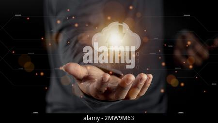 Cloud computing concept - connect to cloud. Businessman or information technologist with cloud computing icon. Stock Photo