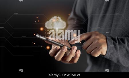 Cloud computing concept - connect to cloud. Businessman or information technologist with cloud computing icon. Stock Photo