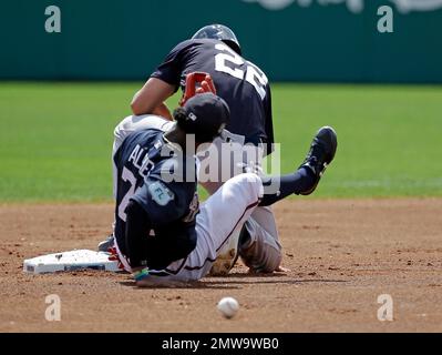 Atlanta, GA, USA. 04th July, 2019. Atlanta Braves shortstop Dansby Swanson  (left) kisses the head of infielder Ozzie Albies (right) after hitting an  eighth inning home run during a MLB game against