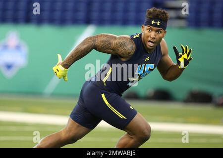 Utah defensive end Pita Taumoepenu competes in the vertical jumpat the ...