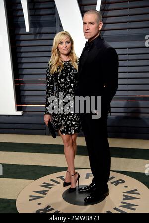 Reese Witherspoon and husband Jim Toth arrive at the Vanity Fair Oscar Party on Monday, Feb. 27, 2017, in Beverly Hills, Calif. (Photo by Evan Agostini/Invision/AP)