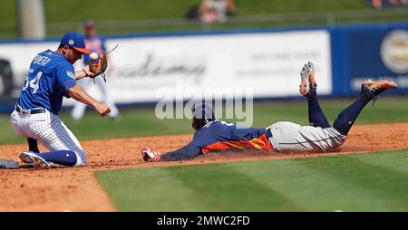 George Springer of the Houston Astros steals second base in the