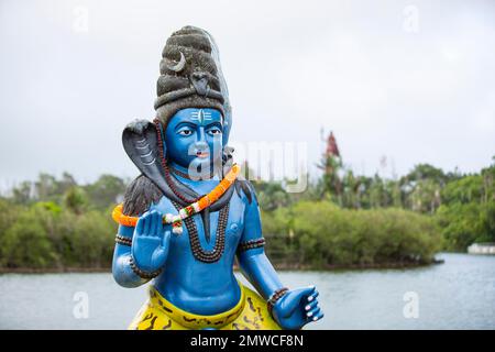 Statue of Lord Shiva at the sacred lake of Ganga Talao in the south of the island of Mauritius Stock Photo