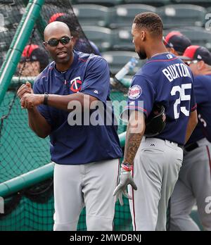 Current Minnesota Twins player Torii Hunter, left, and former