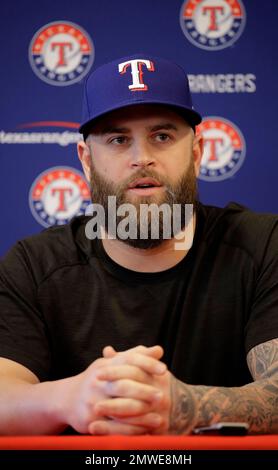 Mike Napoli talks to the media during a news conference at spring training  baseball practice Thursday, Feb. 16, 2017, in Surprise, Ariz. The Rangers  announced that the club has signed free agent