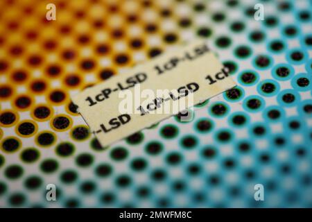 White self made lsd papers colorful drugs macro background and wallpapers in super fine high quality psychedelic hippie indigo trance prints Stock Photo