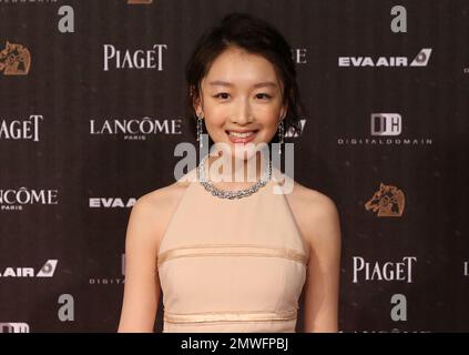 File--Chinese actress Zhou Dongyu attends the 18th Shanghai