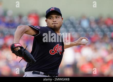 Baseball: Spring training opens; Indians sign pitcher Bruce Chen