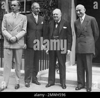 L-R: Anthony Eden, British Foreign Secretary, Dean Acheson, US Secretary of State, Winston Churchill, Britain's Prime Minister and Robert Schuman, French Foreign Minister, shown outside 10 Downing Street in London where they took lunch on June 27, 1952. The foreign ministers held discussions in the morning. (AP Photo/Sidney Smart)