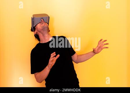 Gamer Man Using Virtual Reality Goggles Stock Photo