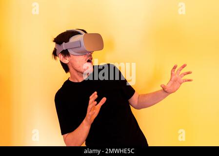 Gamer Man Using Virtual Reality Goggles Stock Photo