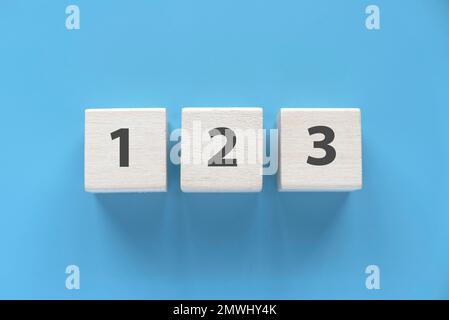 Wooden block with number of one, two and three. Stock Photo
