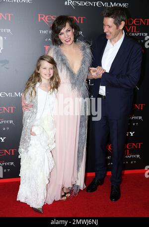 Milla Jovovich and her daughter Ever Gabo Anderson wearing sunglasses