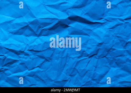 Blue crumpled paper for background. Stock Photo