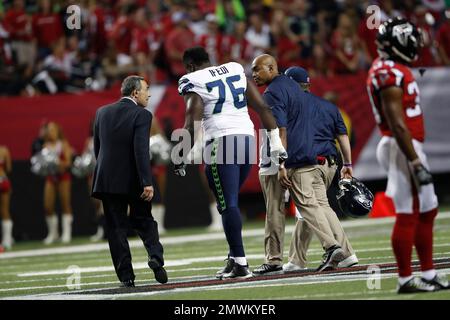 Atlanta Falcons guard Germain Ifedi (74) watches before a preseason NFL  football game against the Detroit Lions in Detroit, Friday, Aug. 12, 2022.  (AP Photo/Paul Sancya Stock Photo - Alamy