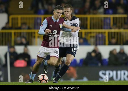 Aston Villa's Jack Grealish, left, competes for the ball with Tottenham's Eric Dier during the English FA Cup third round match between Tottenham Hotspur and Aston Villa at White Hart Lane in London, Sunday Jan. 8, 2017. (AP Photo/Tim Ireland)