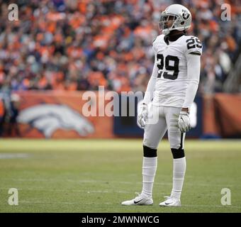 Oakland Raiders cornerback David Amerson (29) defends a pass intended for  San Diego Chargers wide receiver Dontrelle Inman (15) during the second  half of an NFL football game in Oakland, Calif., Thursday