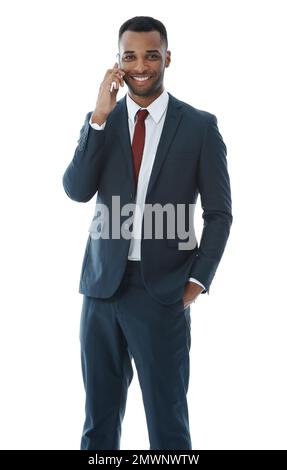 Connecting with his clients. An african american businessman using his smartphone while isolated on white. Stock Photo