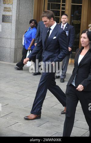 NEW YORK, NY - AUGUST 12: New England Patriots' quarterback Tom Brady and National Football League (NFL) Commissioner Roger Goodell leaving federal court after appealing the National Football League's (NFL) decision to suspend him for four games of the 2015 season on August 12, 2015 in New York City. The NFL alleges that Brady knew footballs used in one of last season's games was deflated below league standards, making it easier to handle  People:  Tom Brady Stock Photo