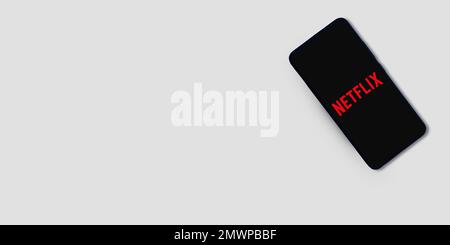29.1, Pakistan. Netflix editorial banner with mobile application and free copy space Stock Photo