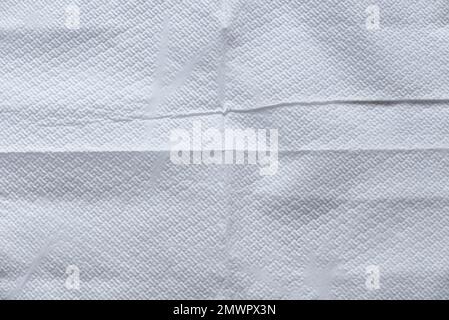 White folded tissue background and texture. Stock Photo