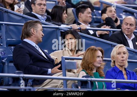 NEW YORK, NY - AUGUST 29: Alec Baldwin (L) and Hilaria Thomas attend the opening ceremony during Day One of the 2011 US Open at the USTA Billie Jean King National Tennis Center on August 29, 2011 in the Flushing neighborhood of the Queens borough of New York City.    People:   Alec Baldwin Hilaria Thomas Martina Navratilova Stock Photo