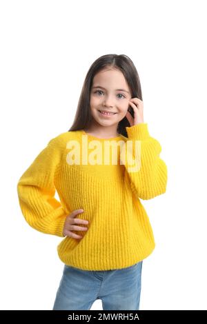 Cute little girl posing on white background Stock Photo - Alamy