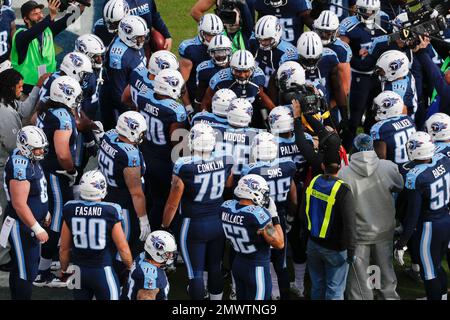 Tennessee Titans and Denver Broncos players join together in a Christmas  prayer on the 50 yard line following an NFL football game on December 25,  2004 at The Coliseum in Nashville, TN.